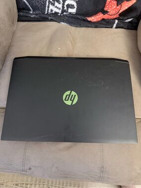 Intel-branded Black Laptop with Green Logo Accent